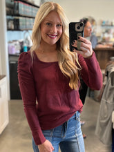 Load image into Gallery viewer, blonde wearing maroon long sleeve shirt