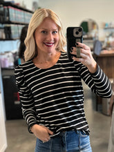 Load image into Gallery viewer, blonde wearing black and white striped shirt