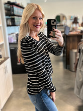 Load image into Gallery viewer, blonde wearing black and white striped shirt