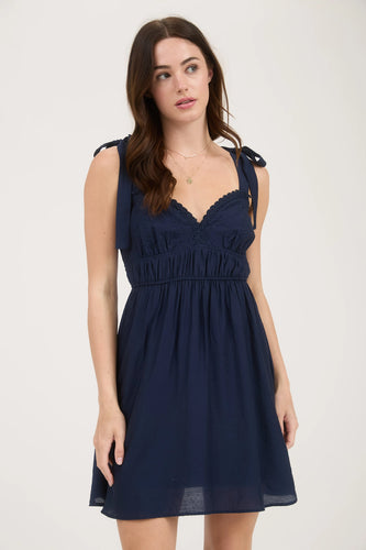 girl wearing navy mini dress