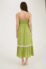 Load image into Gallery viewer, brunette female facing backward wearing green dress with spaghetti straps
