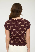 Load image into Gallery viewer, Girl wearing scallop bow sweater facing backwards 

