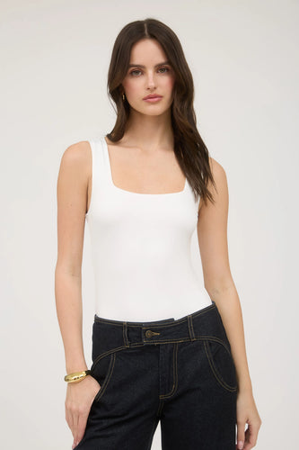 girl wearing white tank top