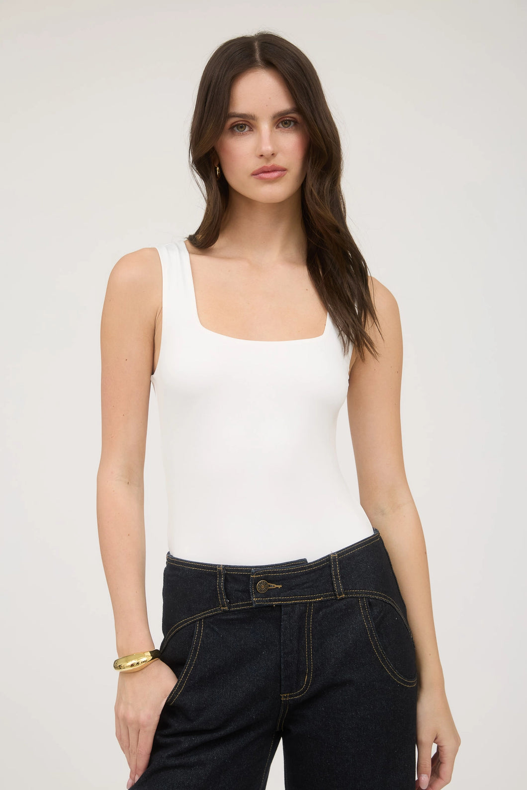 girl wearing white tank top